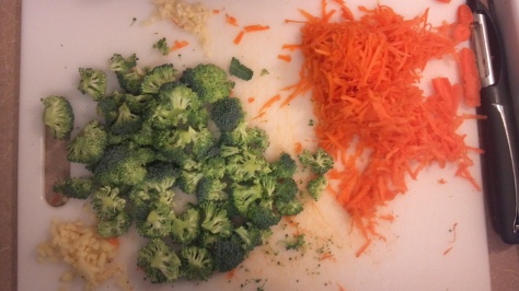 Chop up your carrots, garlic, onion, and broccoli.